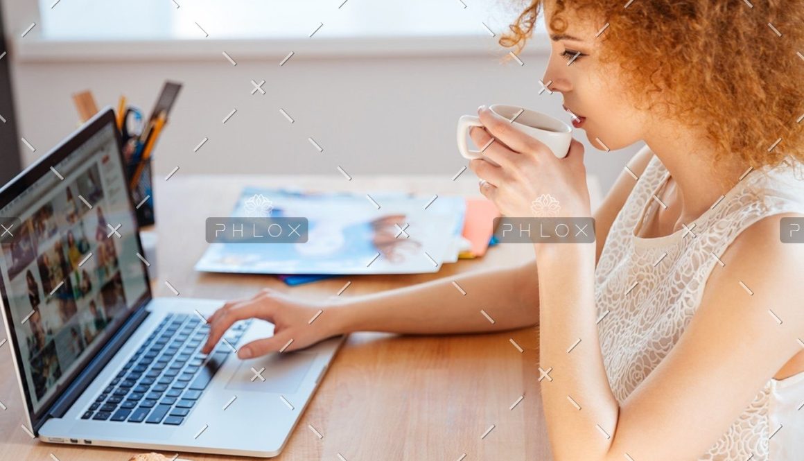 demo-attachment-218-woman-photographer-drinking-coffee-and-working-PJNBP6U@2x